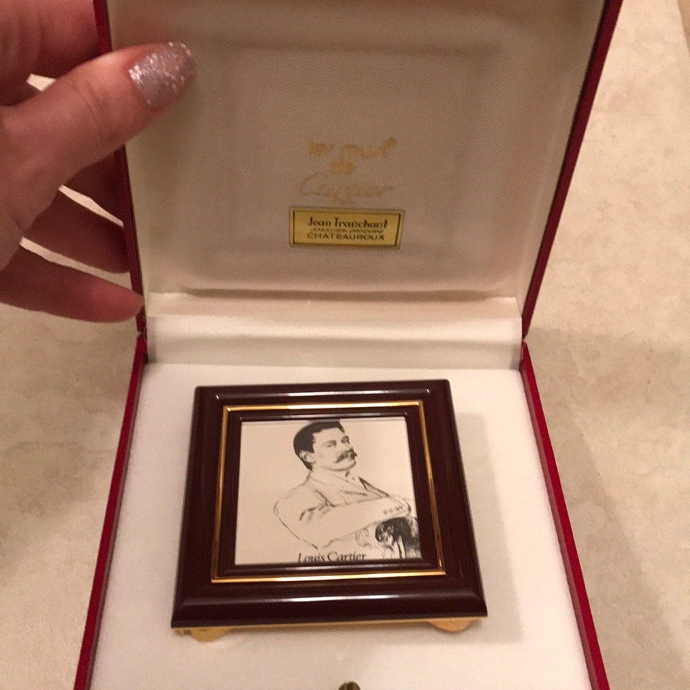 Cartier frame in original box.